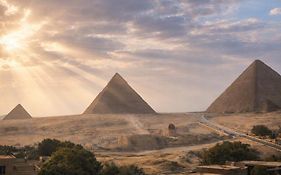 Hathor Palace Pyramids View